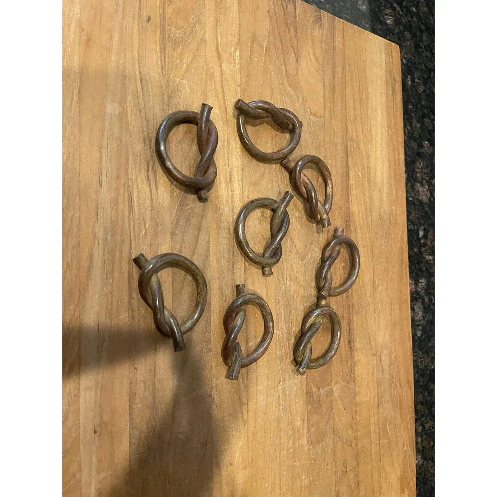 Set of 8 hand-forged iron napkin rings